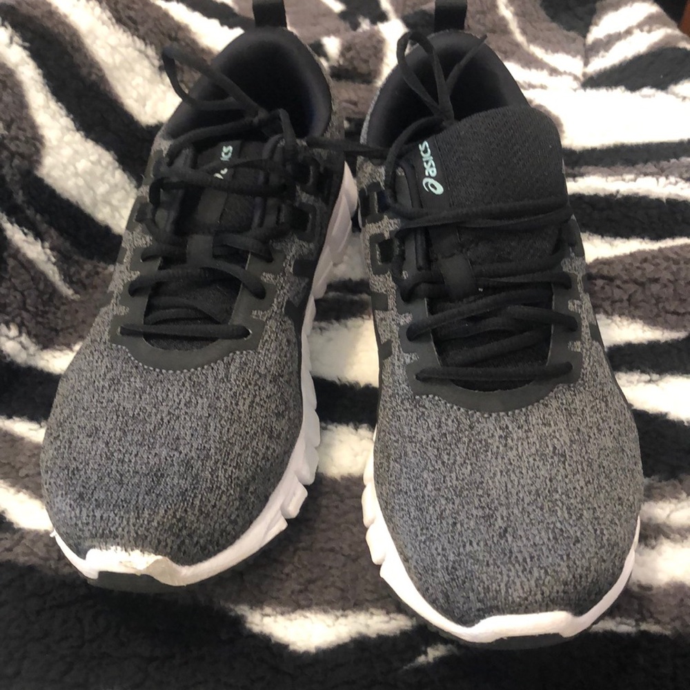 Like new ASICS size 11.  Black, Gray and White .